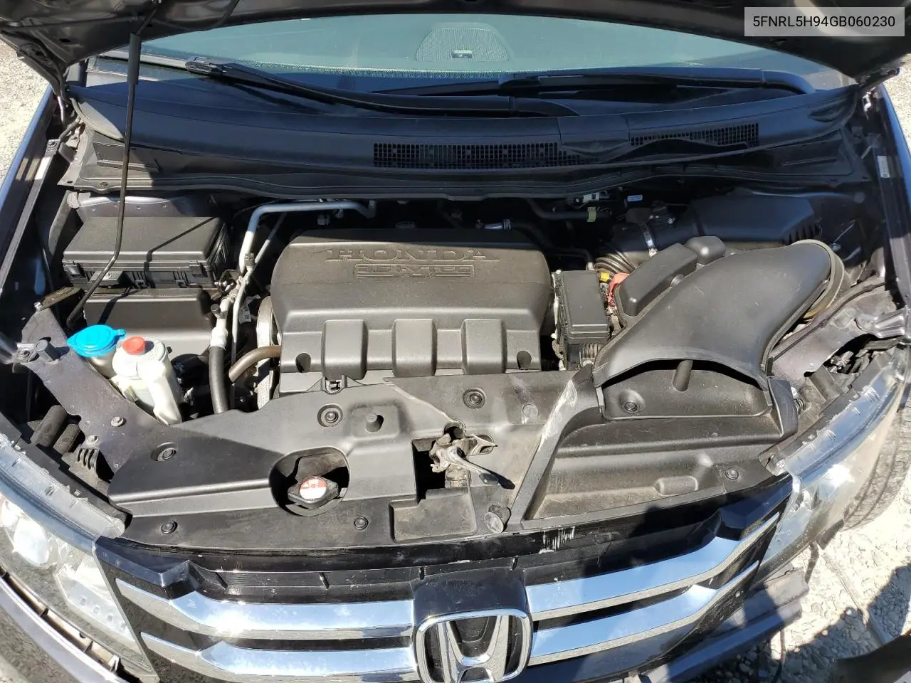 2016 Honda Odyssey Touring VIN: 5FNRL5H94GB060230 Lot: 63266995