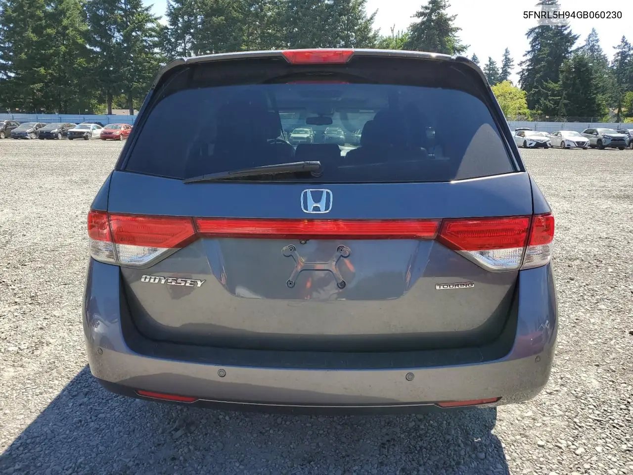 2016 Honda Odyssey Touring VIN: 5FNRL5H94GB060230 Lot: 63266995