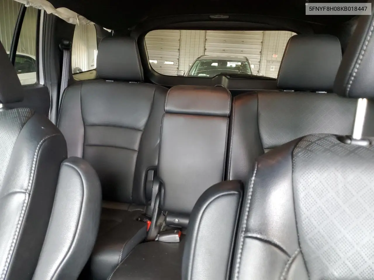 2019 Honda Passport Elite VIN: 5FNYF8H08KB018447 Lot: 64009195
