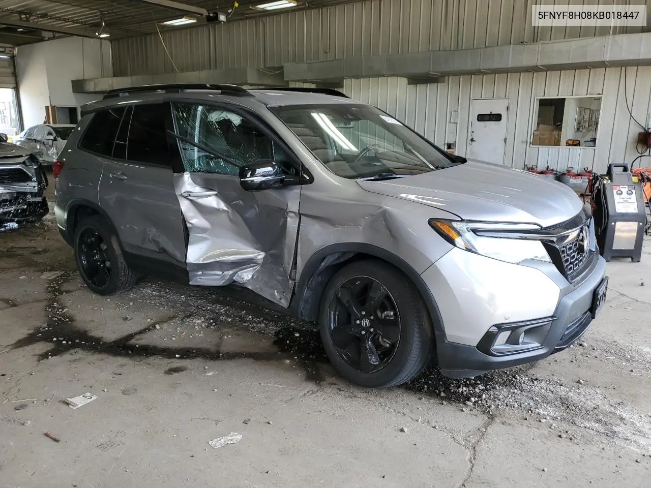 2019 Honda Passport Elite VIN: 5FNYF8H08KB018447 Lot: 64009195