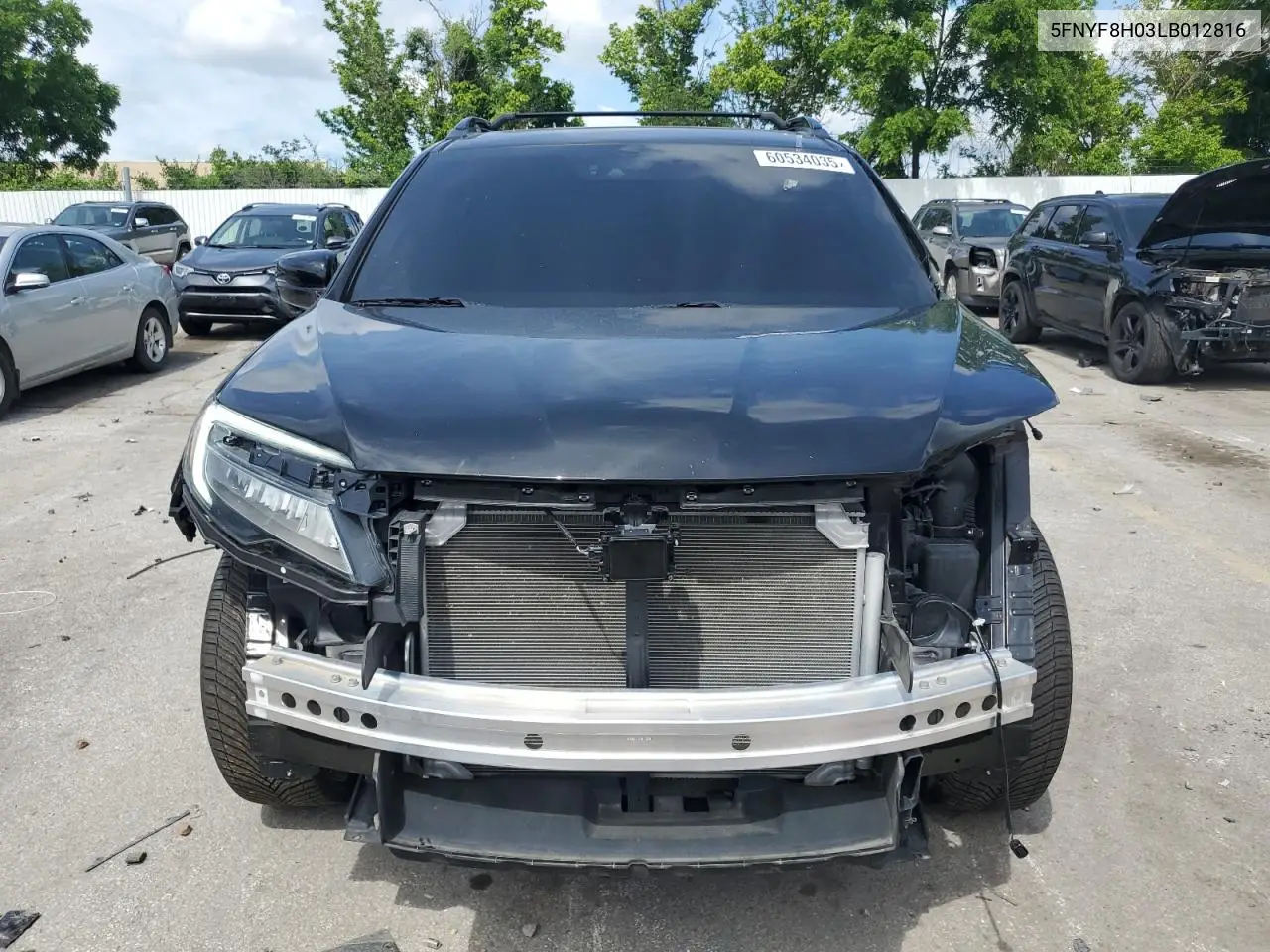 2020 Honda Passport Elite VIN: 5FNYF8H03LB012816 Lot: 60534035