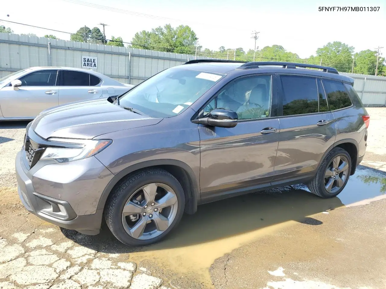2021 Honda Passport Touring VIN: 5FNYF7H97MB011307 Lot: 52310415