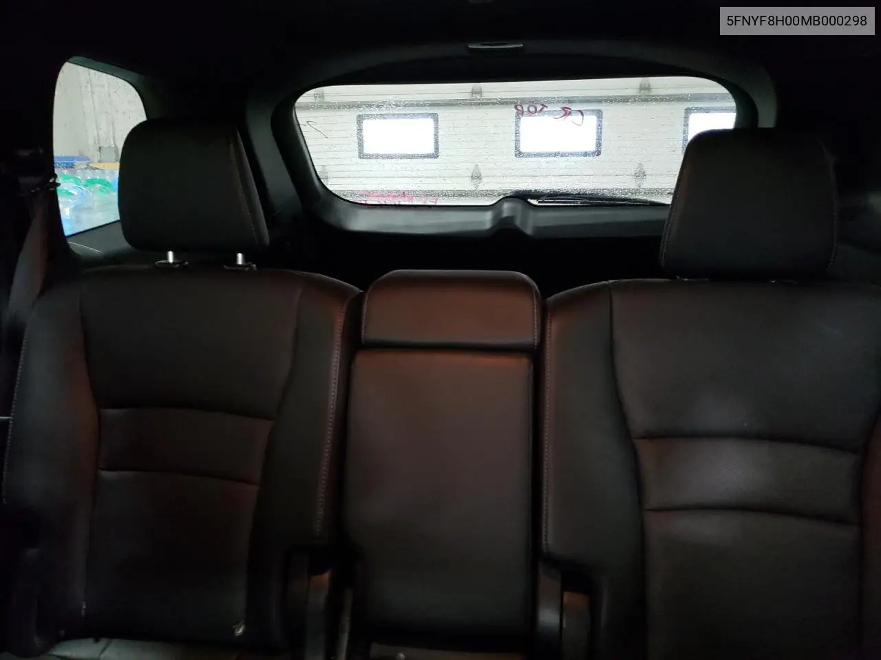 2021 Honda Passport Elite VIN: 5FNYF8H00MB000298 Lot: 59617995