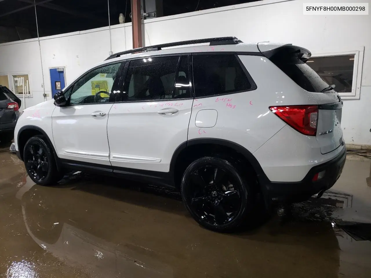 2021 Honda Passport Elite VIN: 5FNYF8H00MB000298 Lot: 59617995
