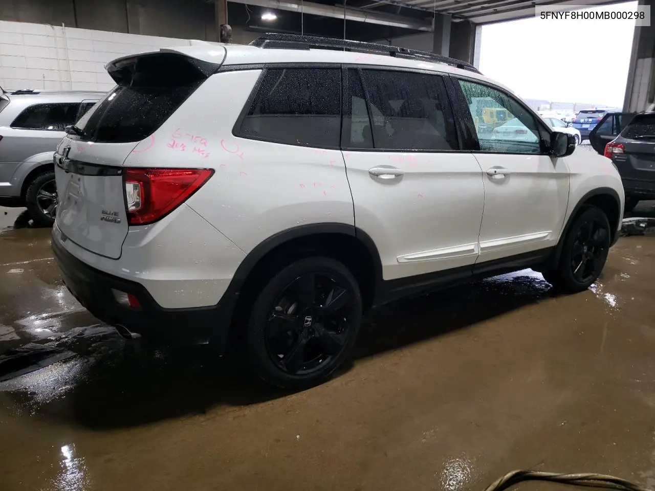 2021 Honda Passport Elite VIN: 5FNYF8H00MB000298 Lot: 59617995