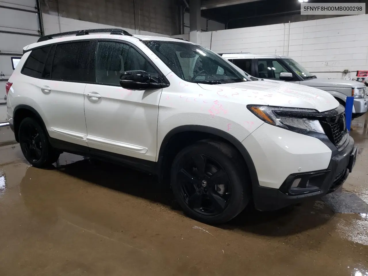 2021 Honda Passport Elite VIN: 5FNYF8H00MB000298 Lot: 59617995
