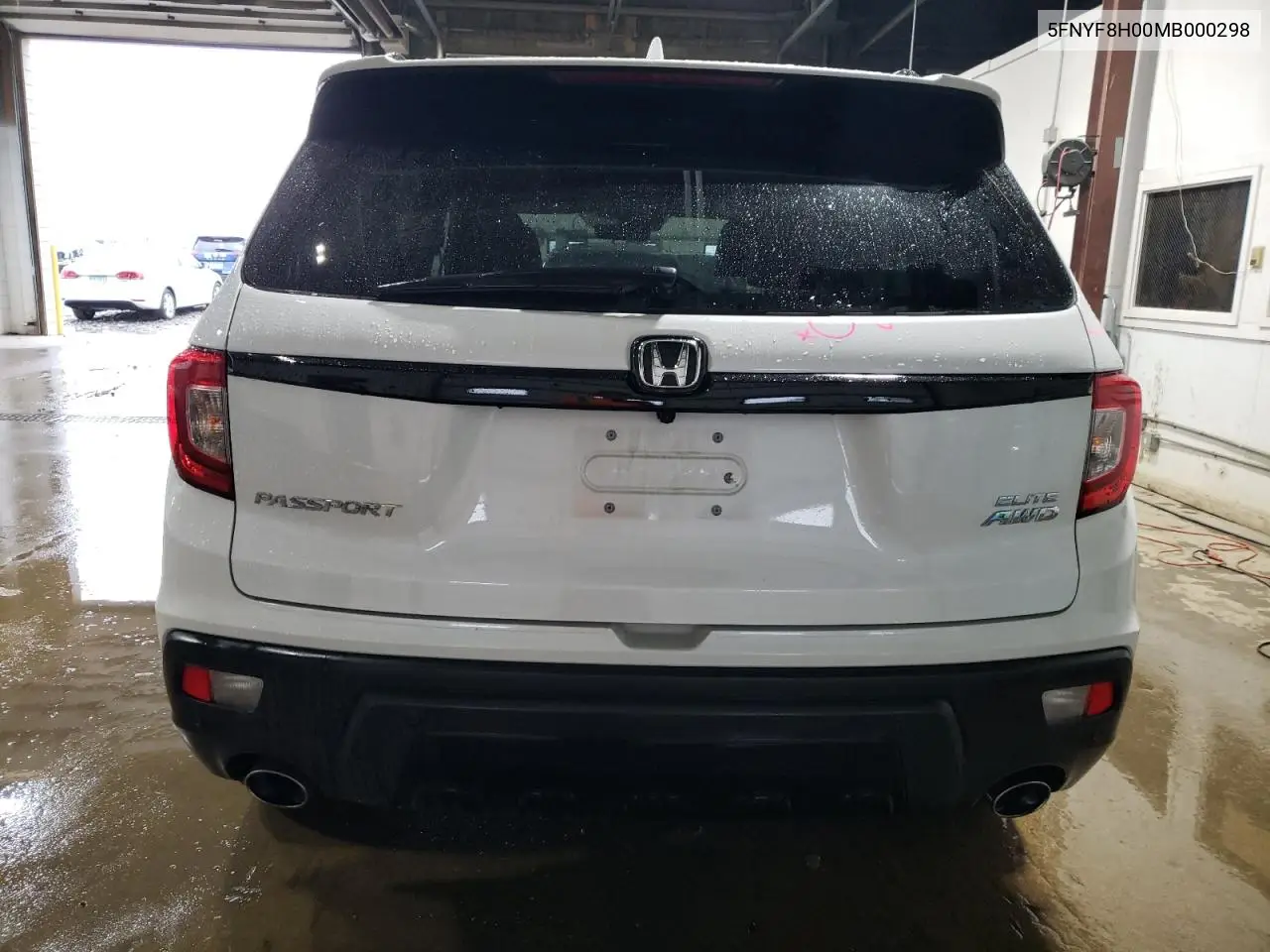 2021 Honda Passport Elite VIN: 5FNYF8H00MB000298 Lot: 59617995