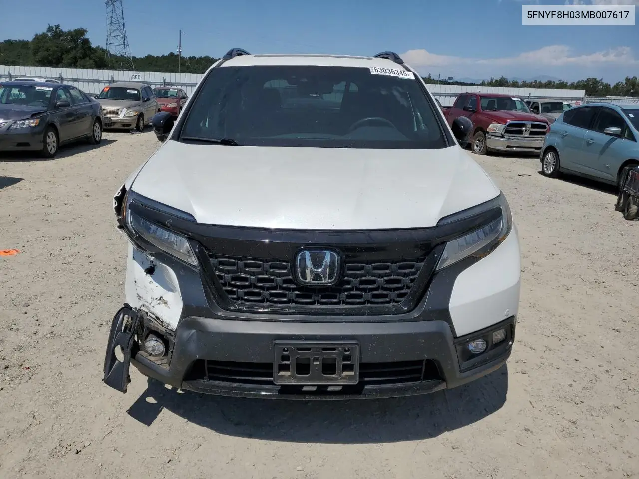 2021 Honda Passport Elite VIN: 5FNYF8H03MB007617 Lot: 63036345
