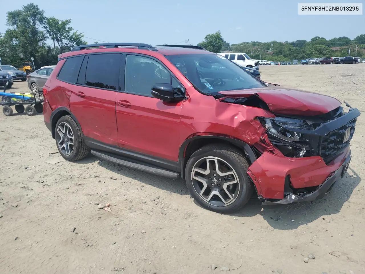 2022 Honda Passport Elite VIN: 5FNYF8H02NB013295 Lot: 60606335