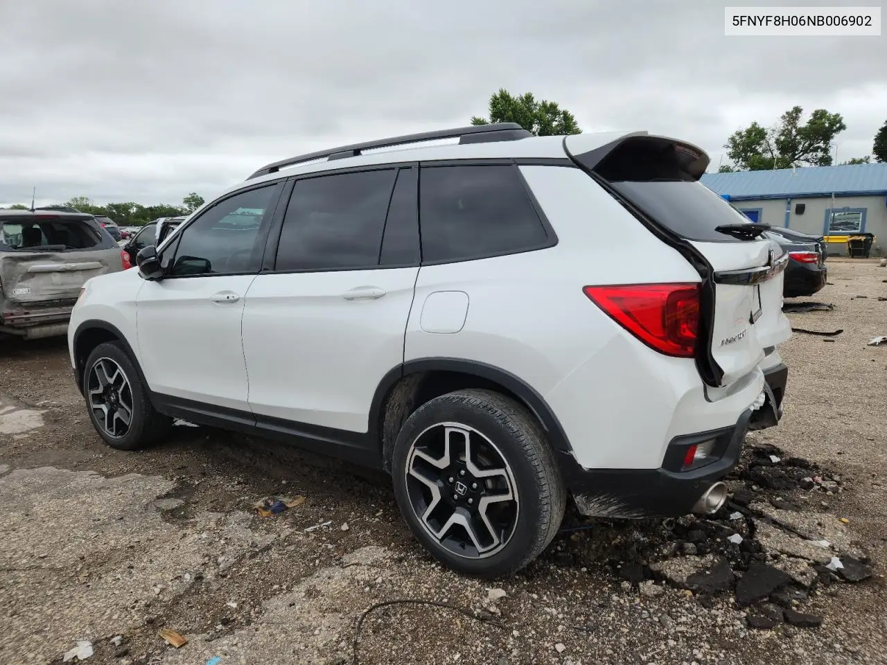 2022 Honda Passport Elite VIN: 5FNYF8H06NB006902 Lot: 60640315