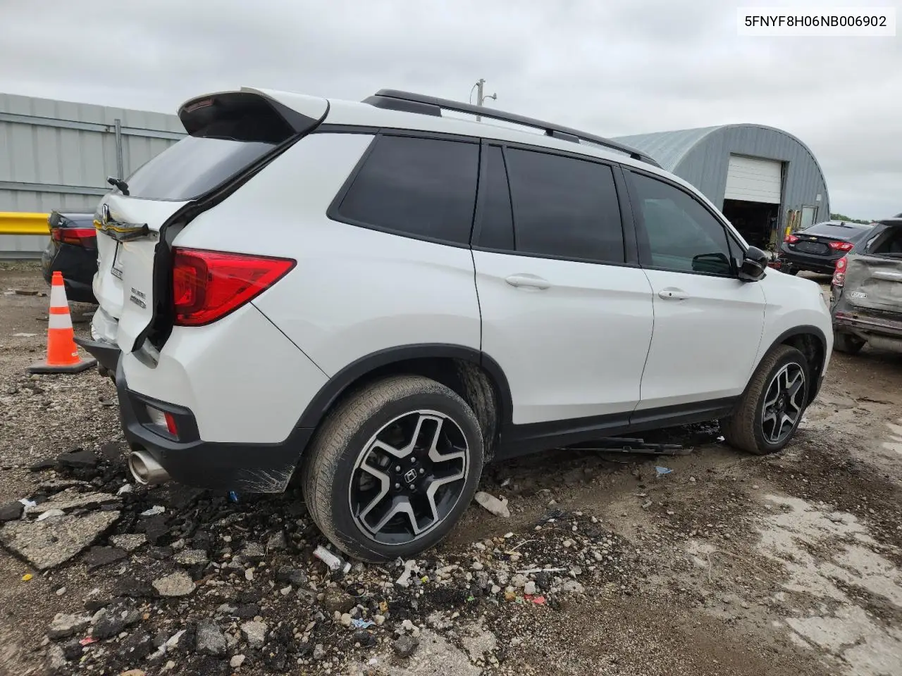 2022 Honda Passport Elite VIN: 5FNYF8H06NB006902 Lot: 60640315