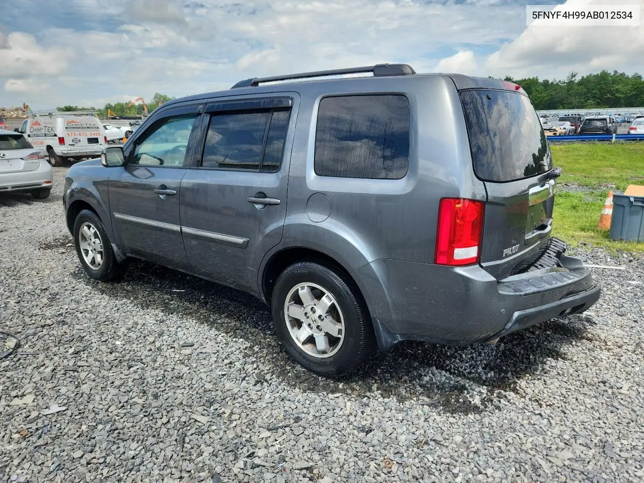 2010 Honda Pilot Touring VIN: 5FNYF4H99AB012534 Lot: 62810345