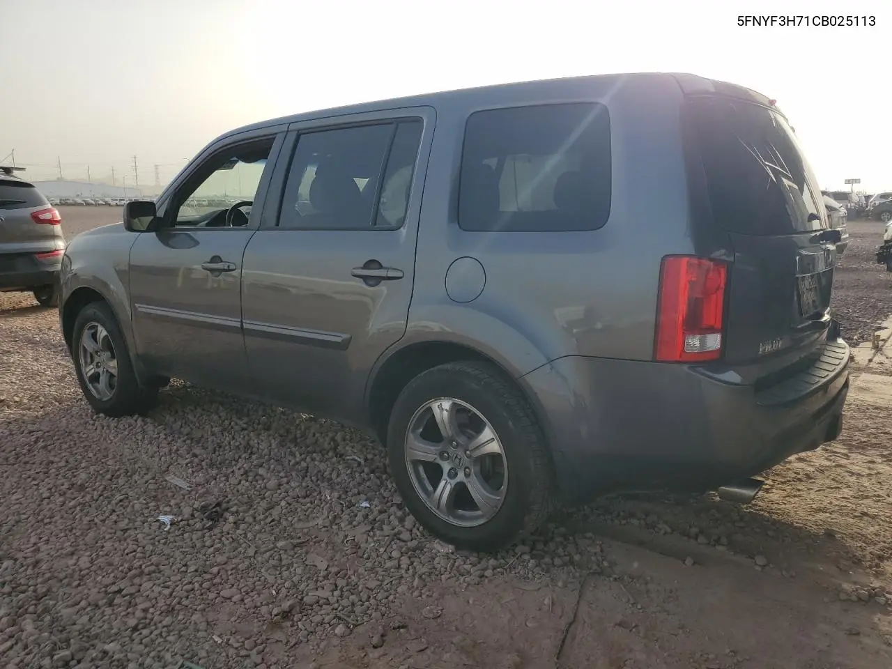 2012 Honda Pilot Exln VIN: 5FNYF3H71CB025113 Lot: 63276405