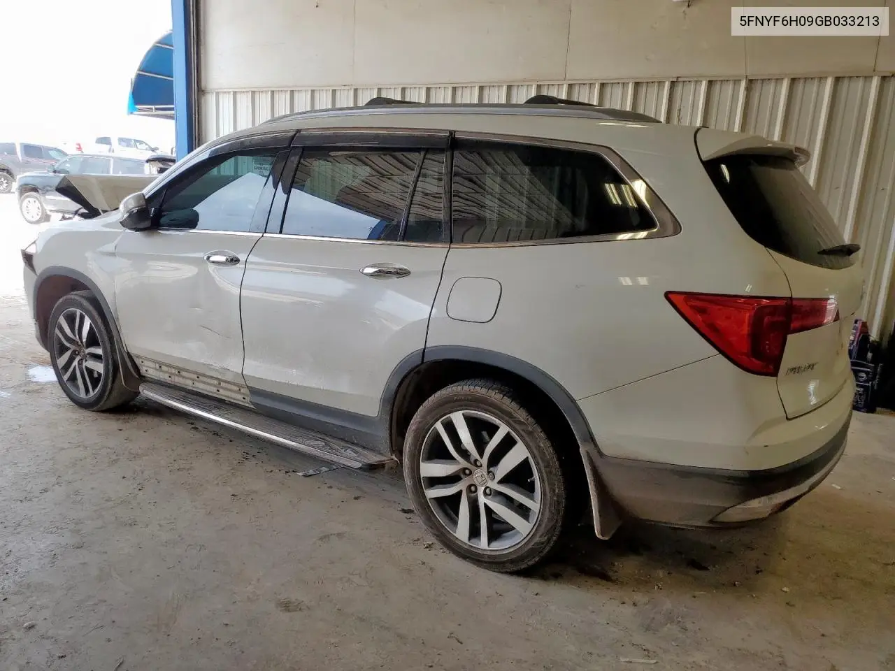 2016 Honda Pilot Elite VIN: 5FNYF6H09GB033213 Lot: 57102535