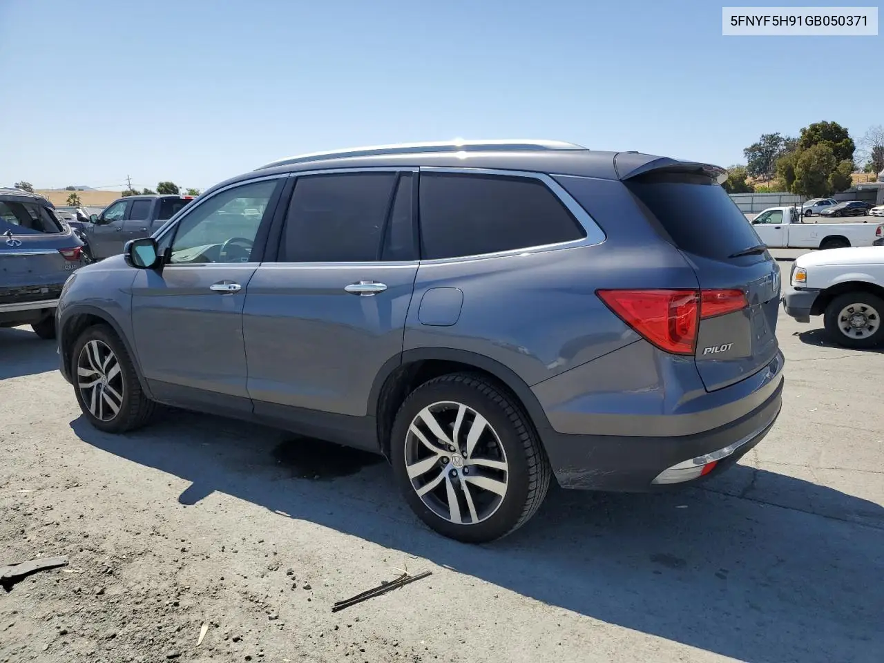 2016 Honda Pilot Touring VIN: 5FNYF5H91GB050371 Lot: 63069245