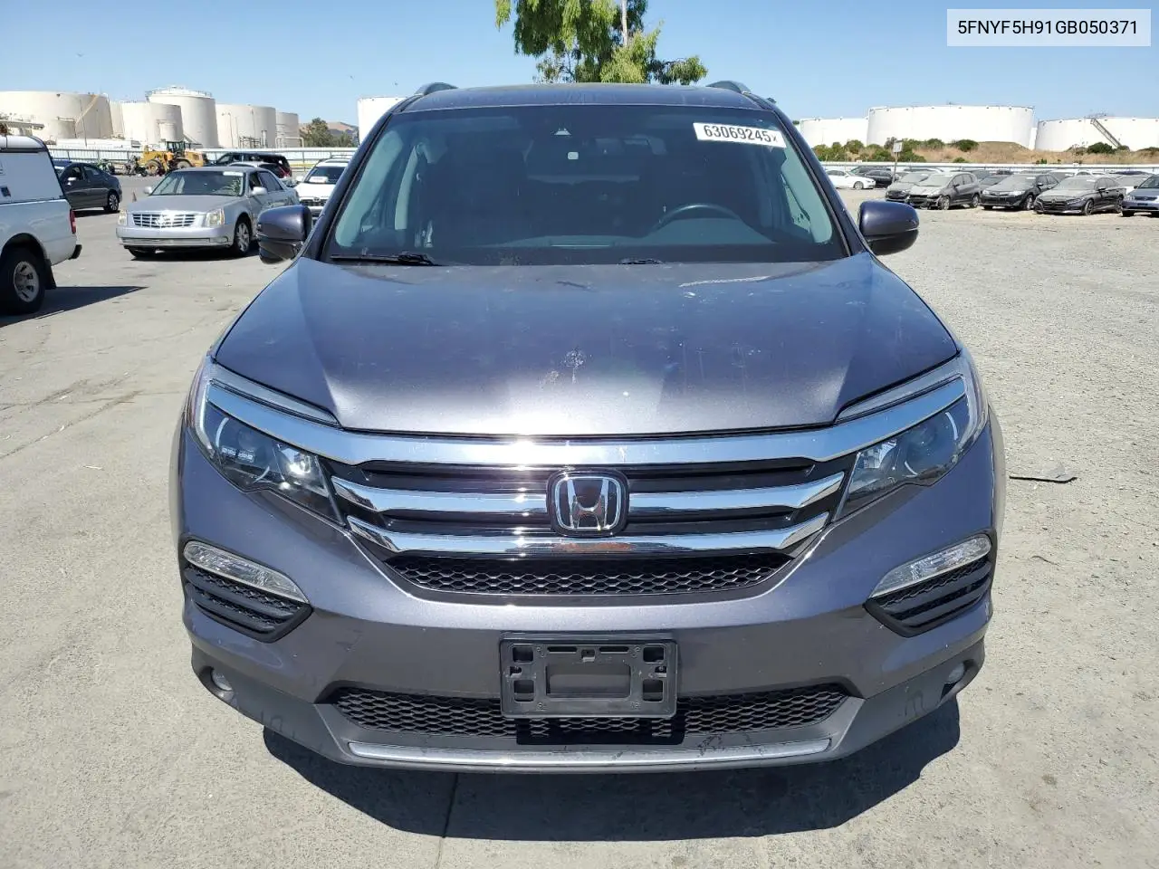 2016 Honda Pilot Touring VIN: 5FNYF5H91GB050371 Lot: 63069245