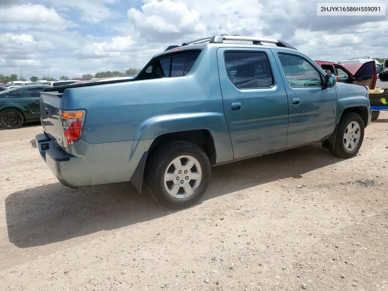 2006 Honda Ridgeline Rtl VIN: 2HJYK16586H559091 Lot: 63157865