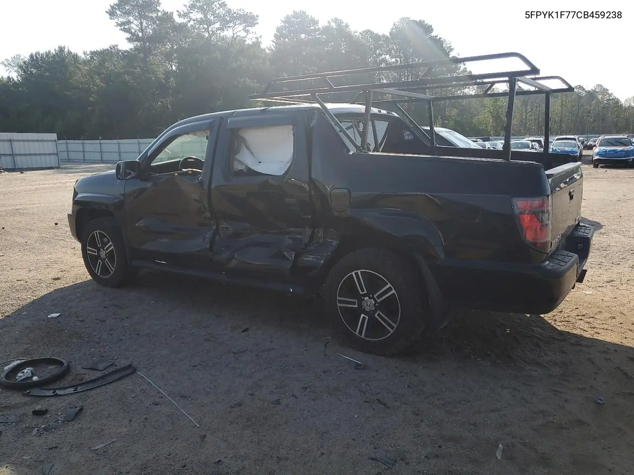 2012 Honda Ridgeline Sport VIN: 5FPYK1F77CB459238 Lot: 62516435