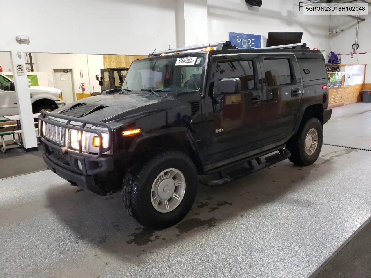 2003 Hummer H2 VIN: 5GRGN23U13H102048 Lot: 52648065