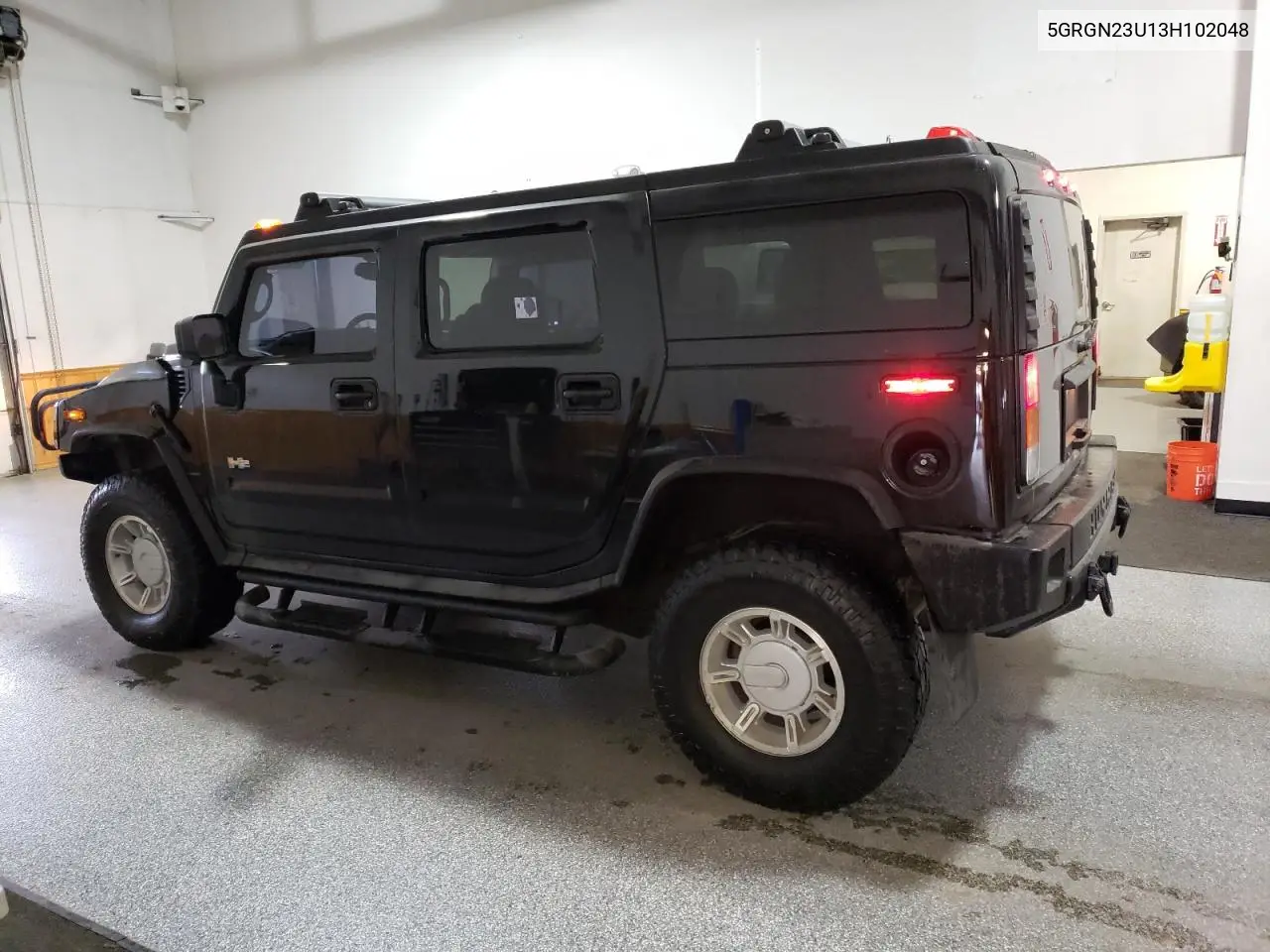 2003 Hummer H2 VIN: 5GRGN23U13H102048 Lot: 52648065
