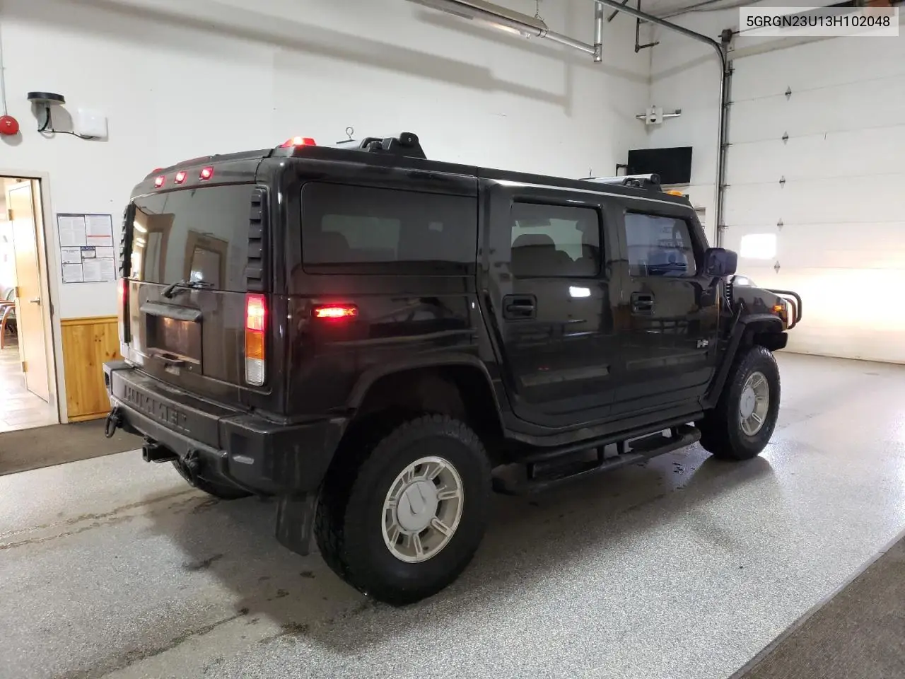 2003 Hummer H2 VIN: 5GRGN23U13H102048 Lot: 52648065