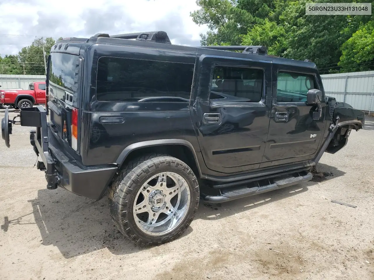 2003 Hummer H2 VIN: 5GRGN23U33H131048 Lot: 61176545