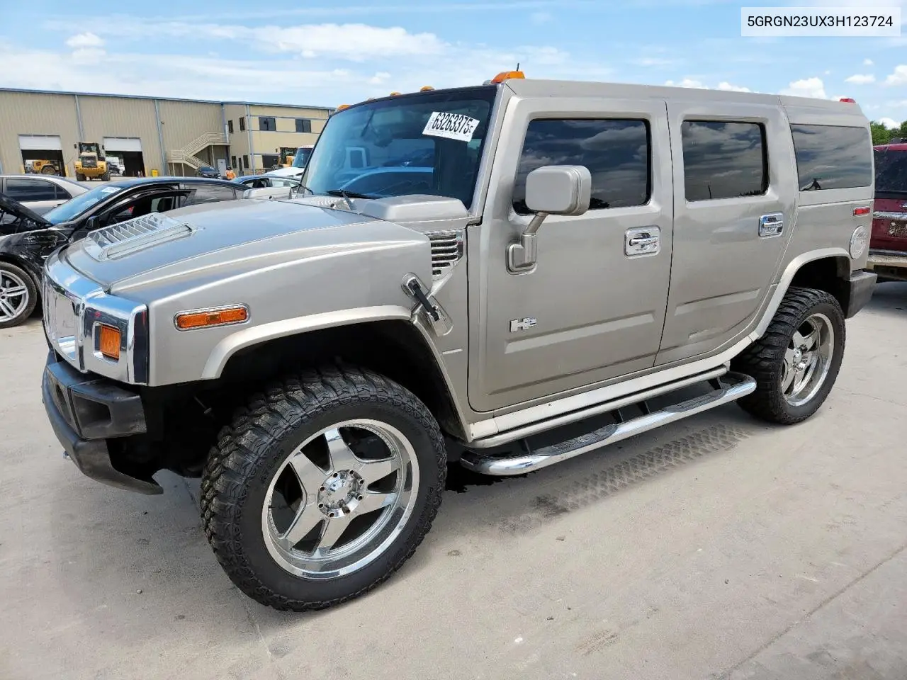 2003 Hummer H2 VIN: 5GRGN23UX3H123724 Lot: 63263375