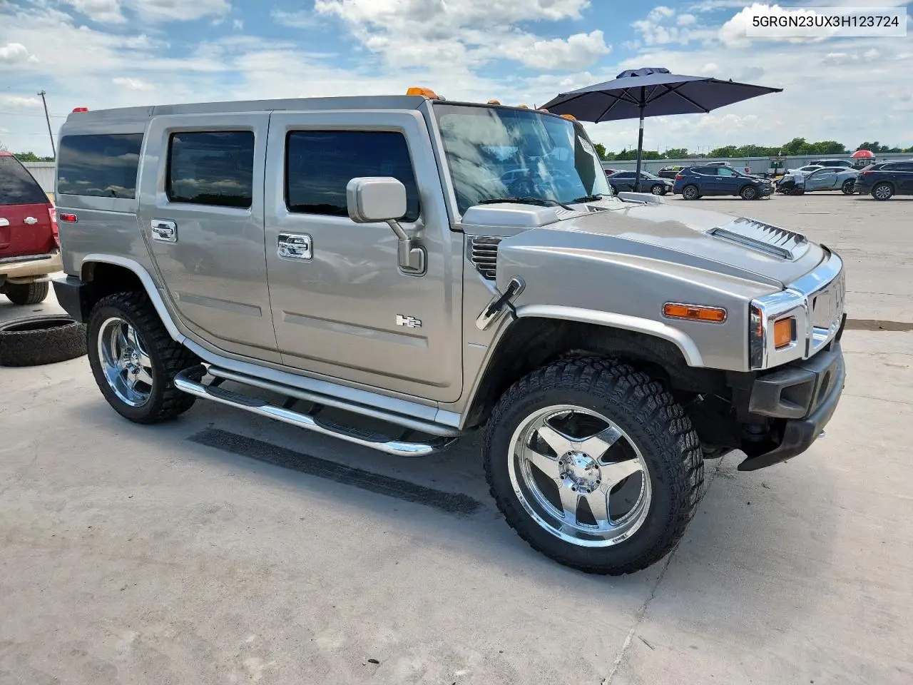 2003 Hummer H2 VIN: 5GRGN23UX3H123724 Lot: 63263375