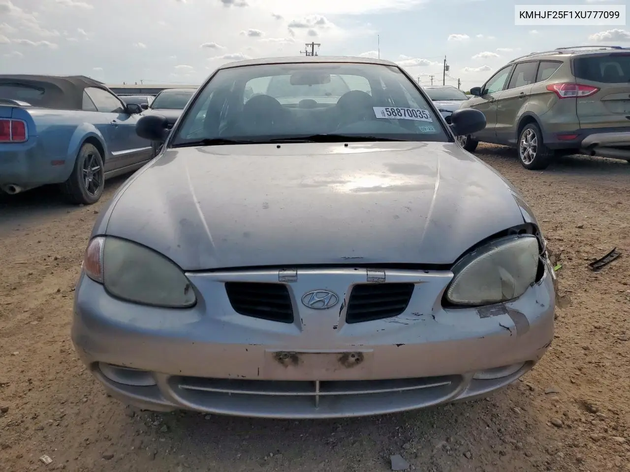 1999 Hyundai Elantra Base VIN: KMHJF25F1XU777099 Lot: 58870035