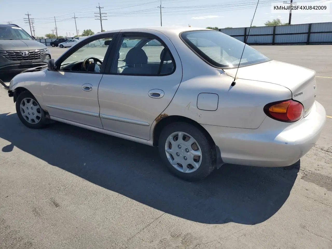 1999 Hyundai Elantra Base VIN: KMHJF25F4XU842009 Lot: 60836875