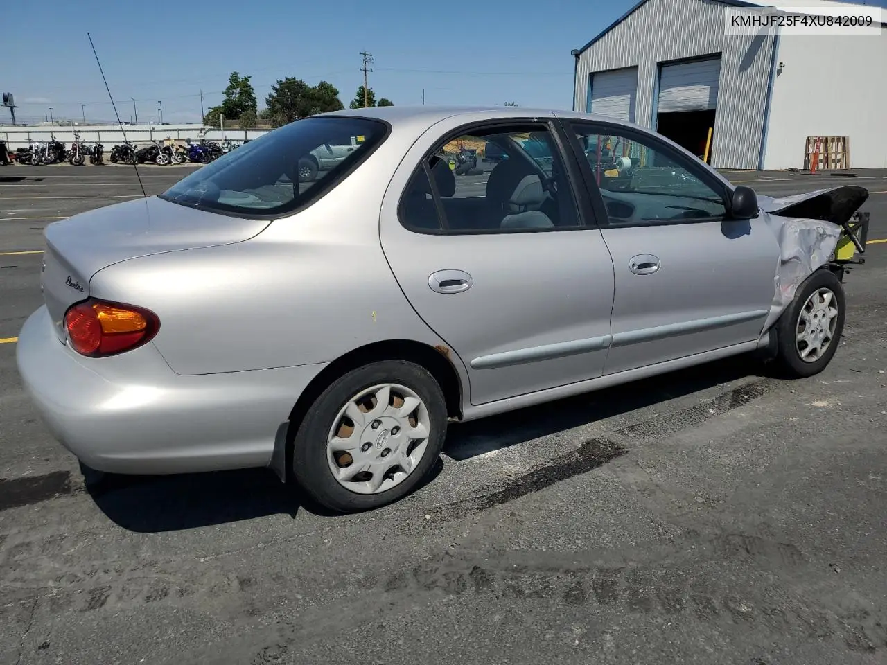 1999 Hyundai Elantra Base VIN: KMHJF25F4XU842009 Lot: 60836875