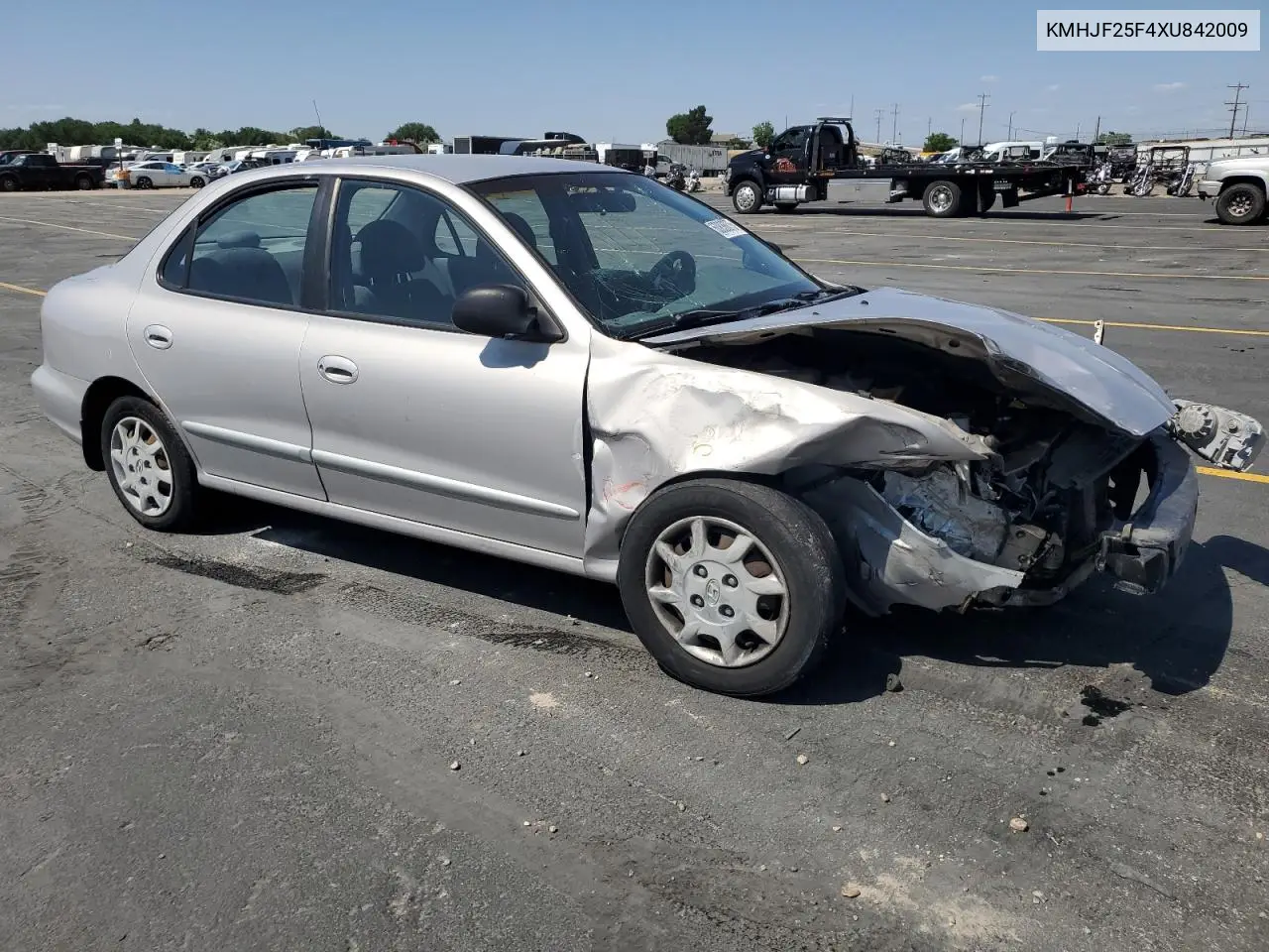 1999 Hyundai Elantra Base VIN: KMHJF25F4XU842009 Lot: 60836875