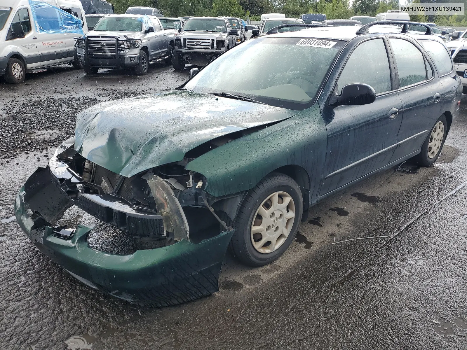1999 Hyundai Elantra Base VIN: KMHJW25F1XU139421 Lot: 69031094