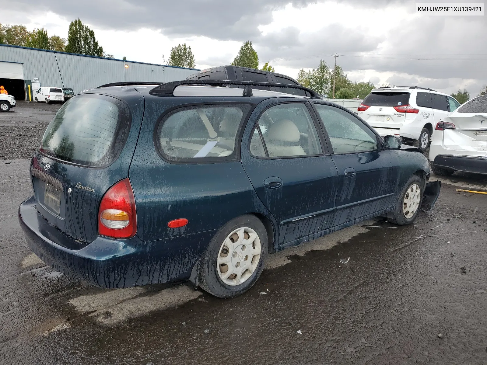 1999 Hyundai Elantra Base VIN: KMHJW25F1XU139421 Lot: 69031094