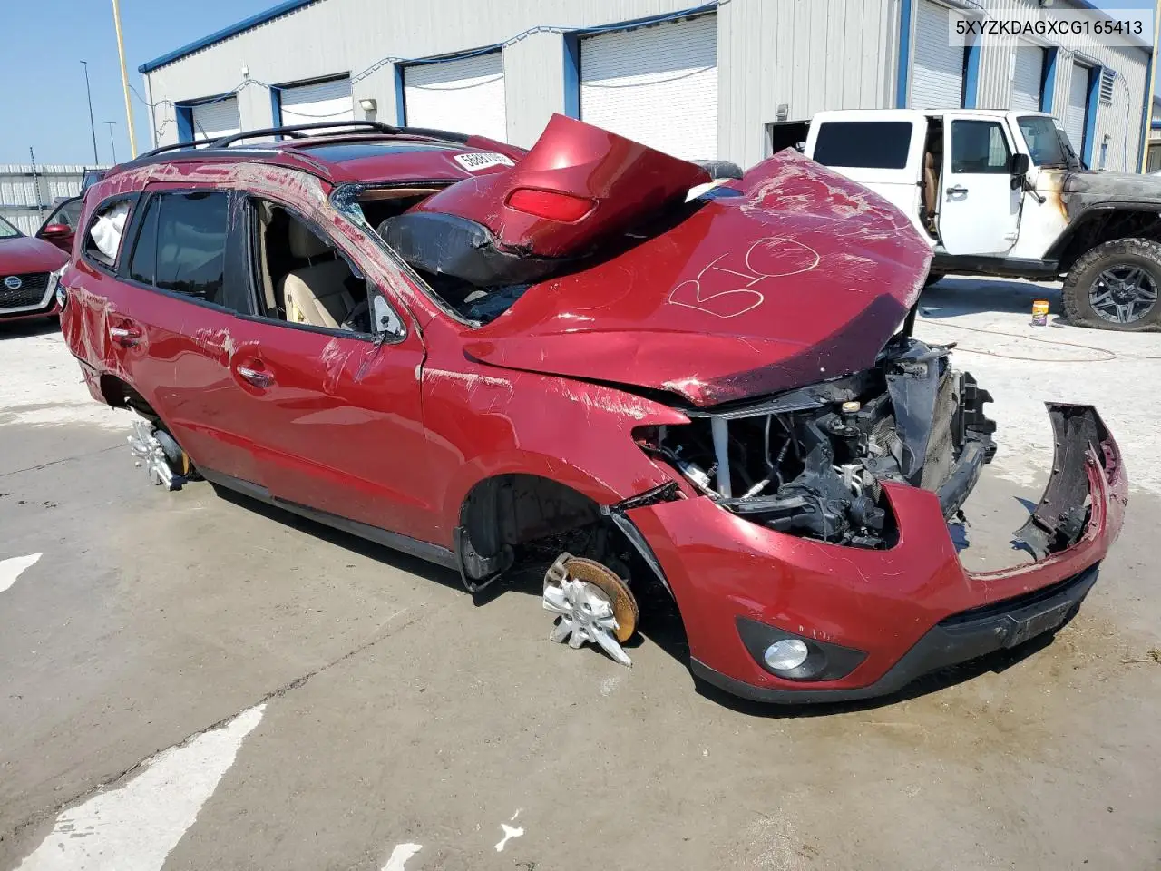 2012 Hyundai Santa Fe Limited VIN: 5XYZKDAGXCG165413 Lot: 56887095