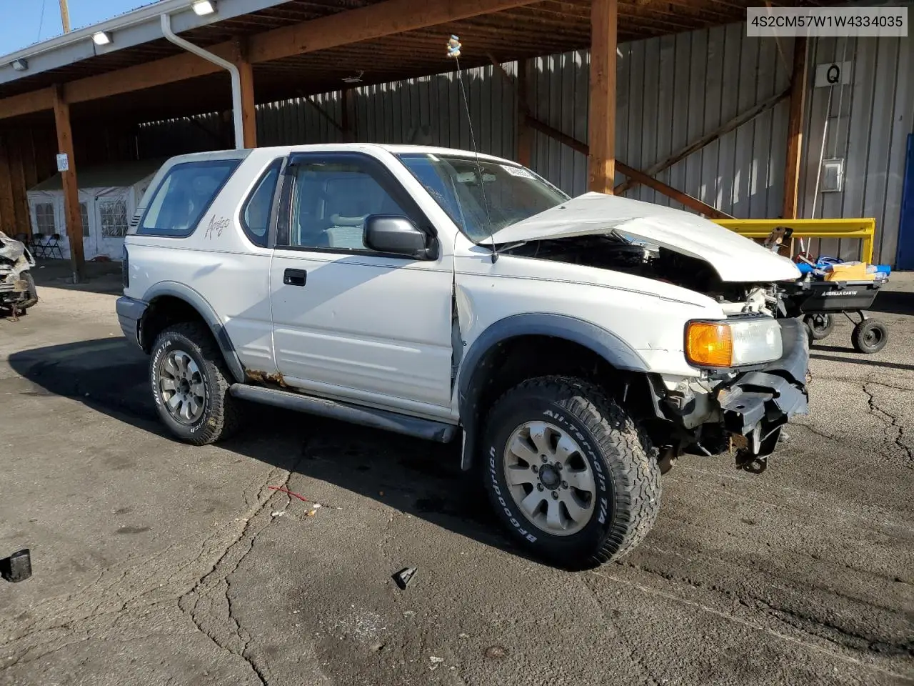 1998 Isuzu Amigo VIN: 4S2CM57W1W4334035 Lot: 54359355