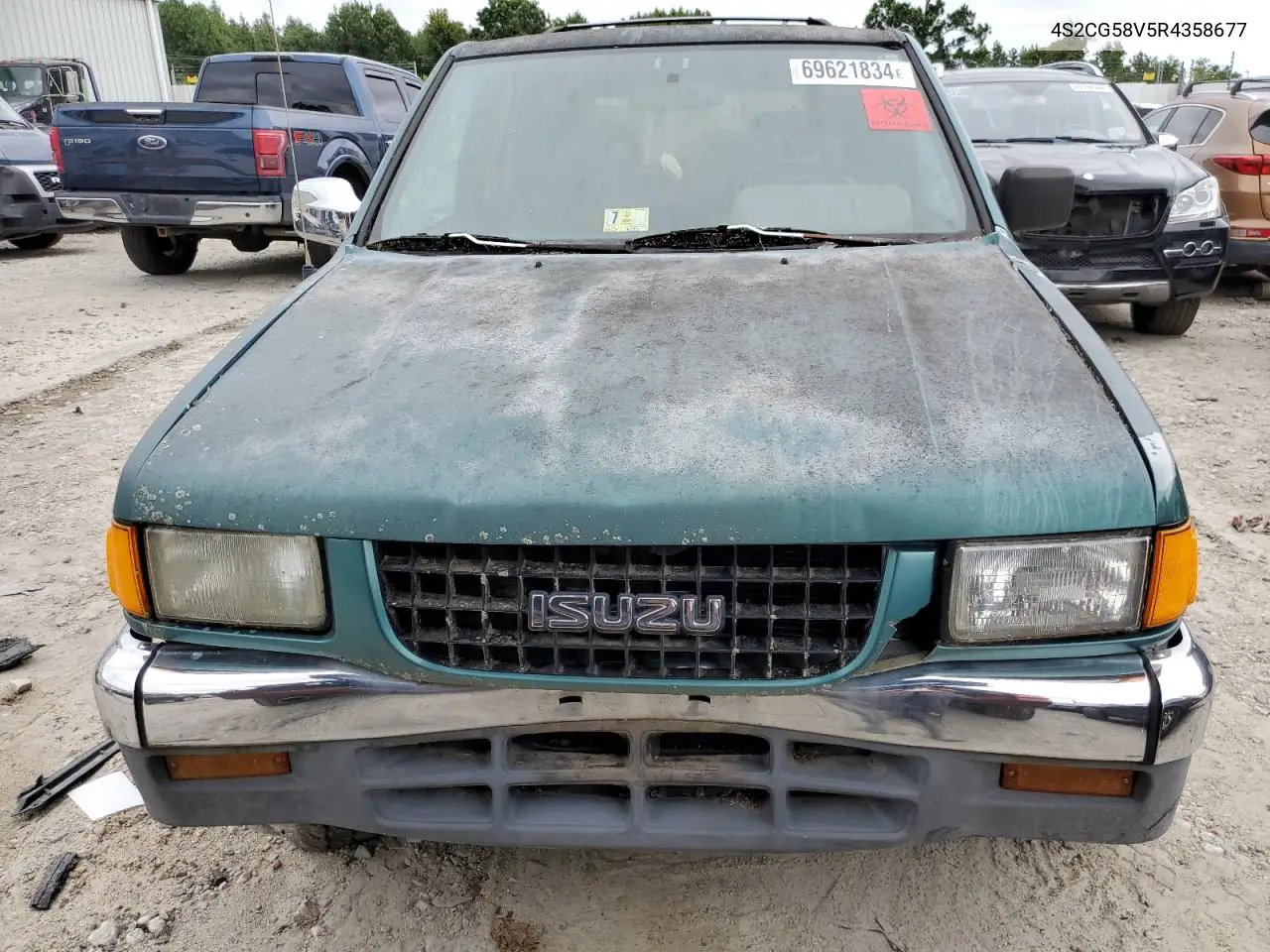 1999 Isuzu Rodeo S VIN: 4S2CG58V5R4358677 Lot: 50691255