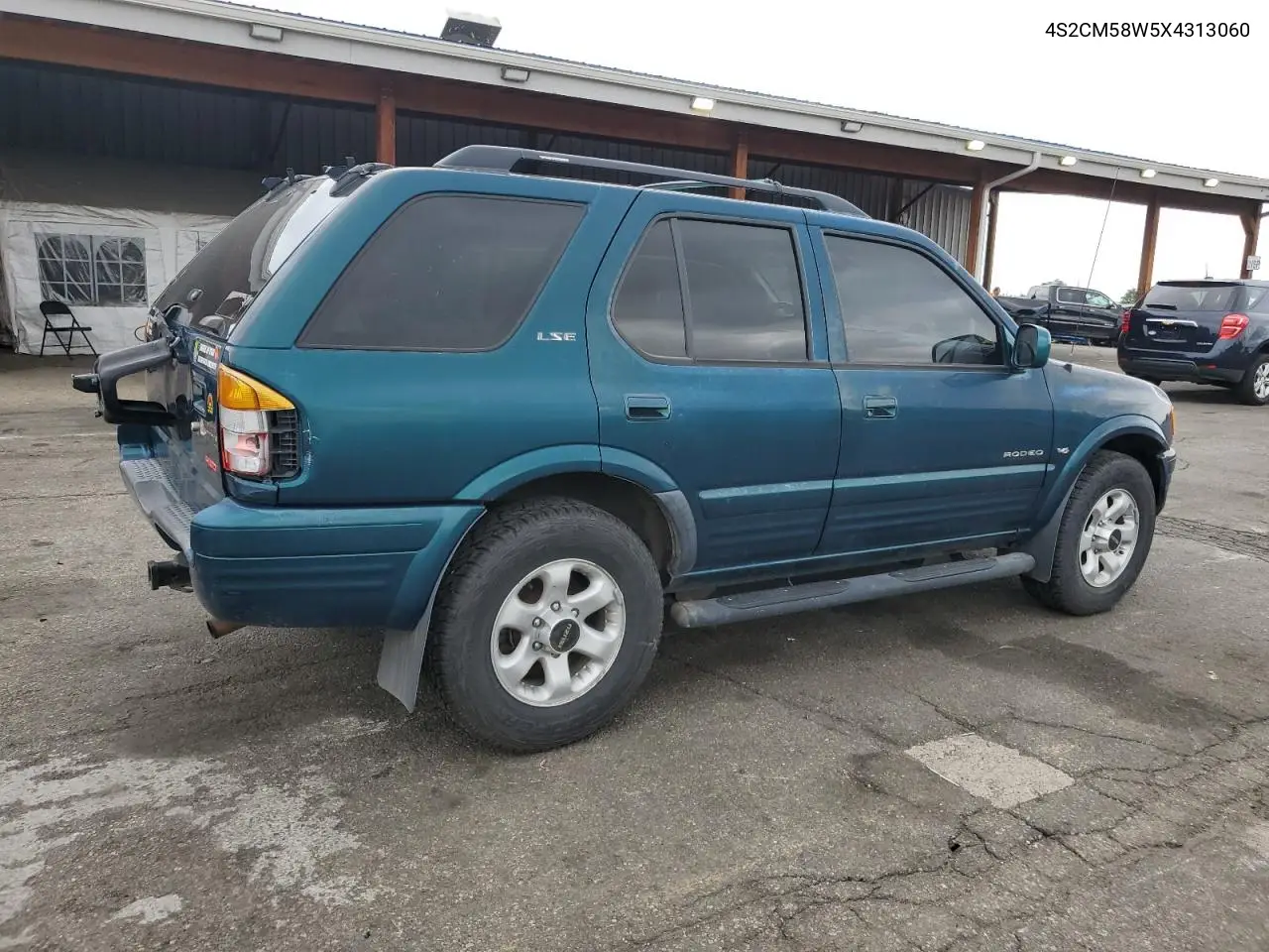 1999 Isuzu Rodeo S VIN: 4S2CM58W5X4313060 Lot: 62211235