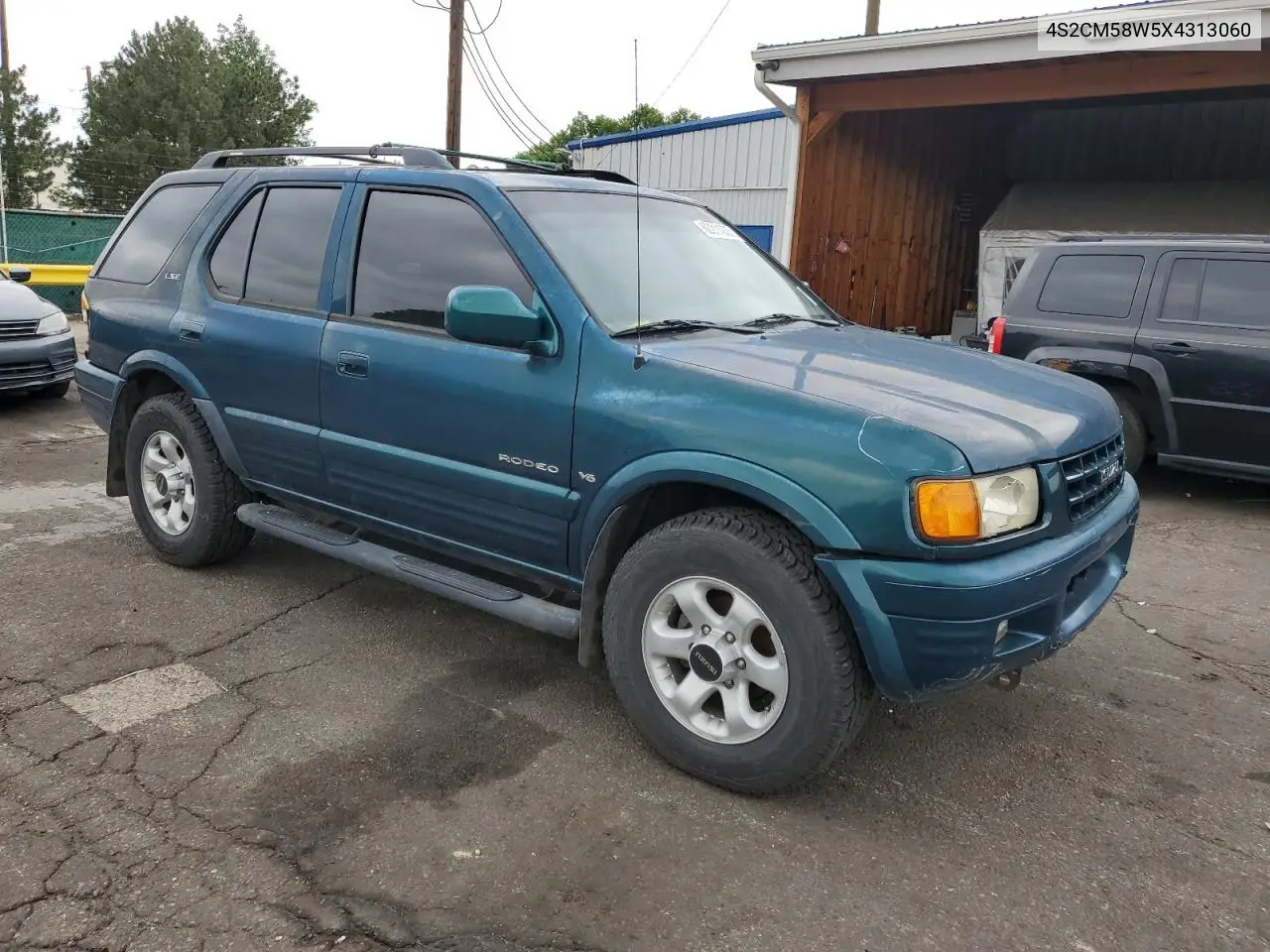 1999 Isuzu Rodeo S VIN: 4S2CM58W5X4313060 Lot: 62211235
