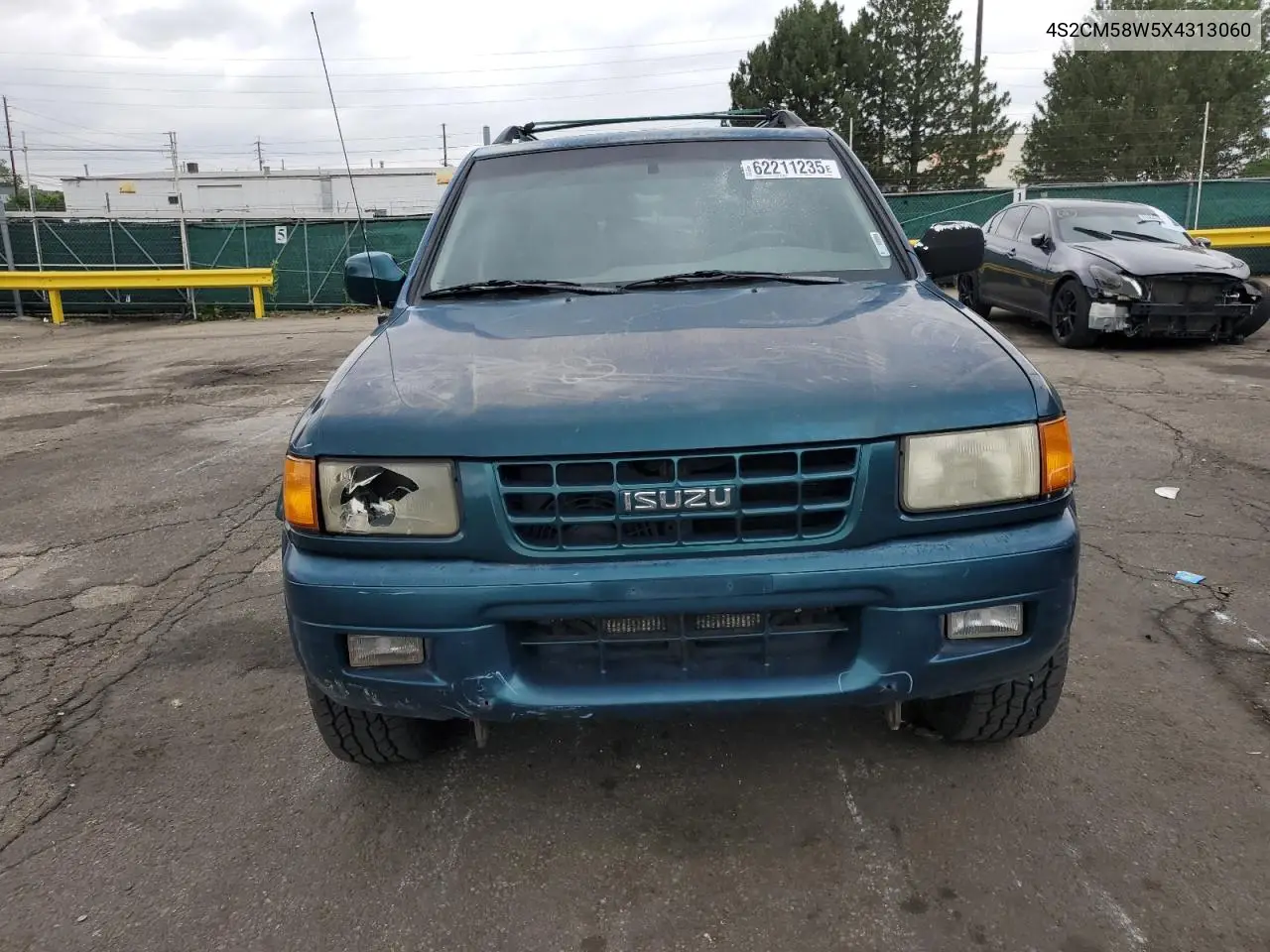 1999 Isuzu Rodeo S VIN: 4S2CM58W5X4313060 Lot: 62211235