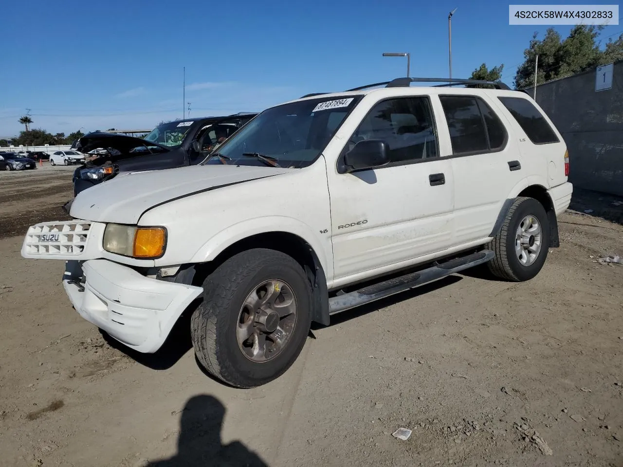 1999 Isuzu Rodeo S VIN: 4S2CK58W4X4302833 Lot: 87487894