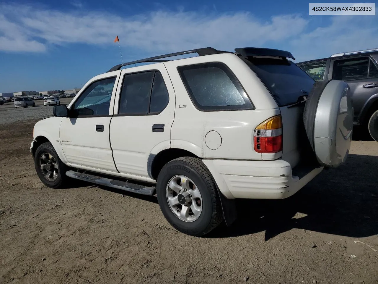 1999 Isuzu Rodeo S VIN: 4S2CK58W4X4302833 Lot: 87487894