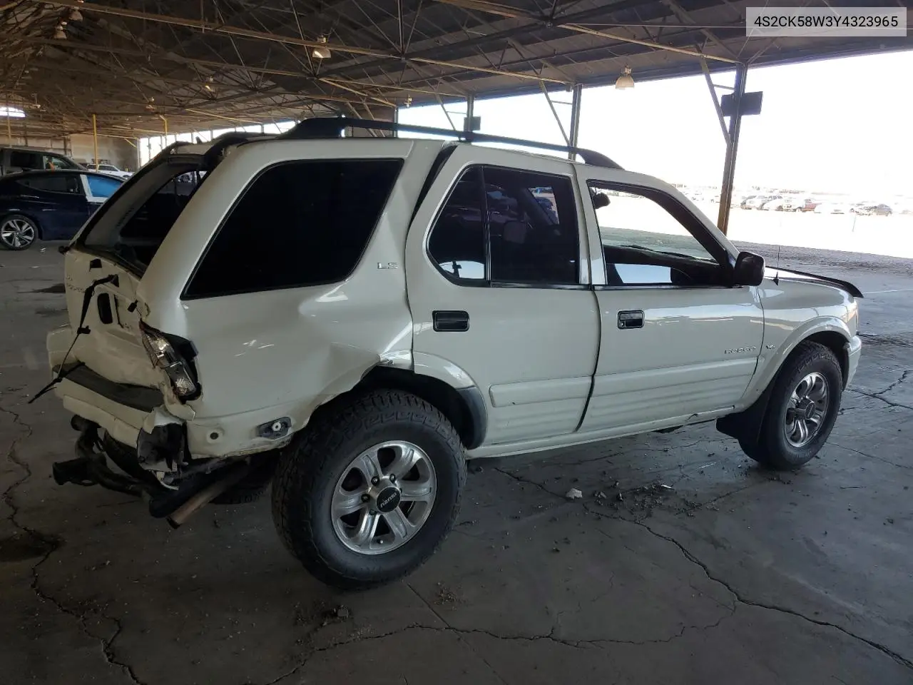 2000 Isuzu Rodeo S VIN: 4S2CK58W3Y4323965 Lot: 61189435