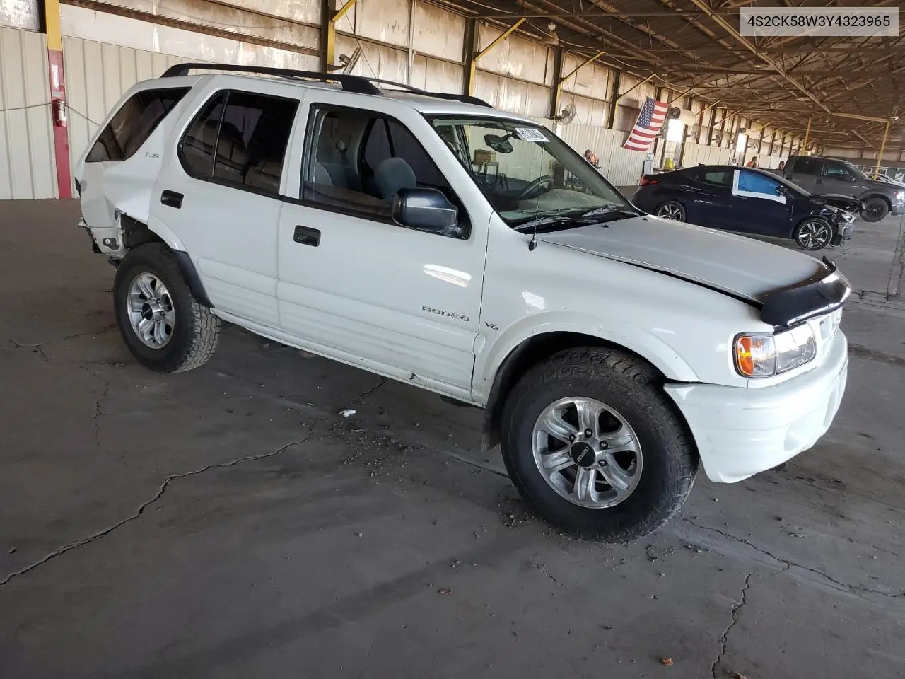 2000 Isuzu Rodeo S VIN: 4S2CK58W3Y4323965 Lot: 61189435
