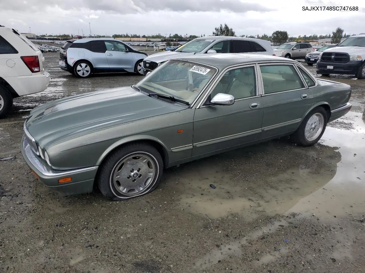 1995 Jaguar Vandenplas VIN: SAJKX1748SC747688 Lot: 50992475