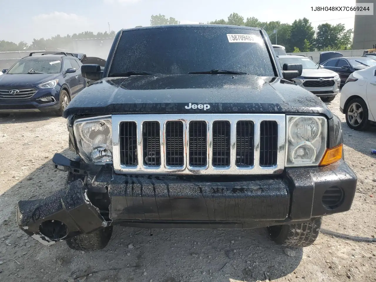 2007 Jeep Commander VIN: 1J8HG48KX7C669244 Lot: 58709485