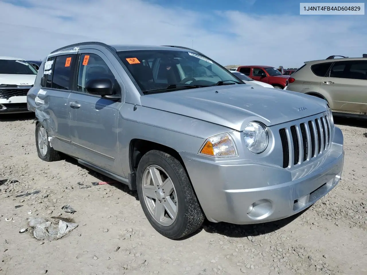 2010 Jeep Compass Sport VIN: 1J4NT4FB4AD604829 Lot: 50004455