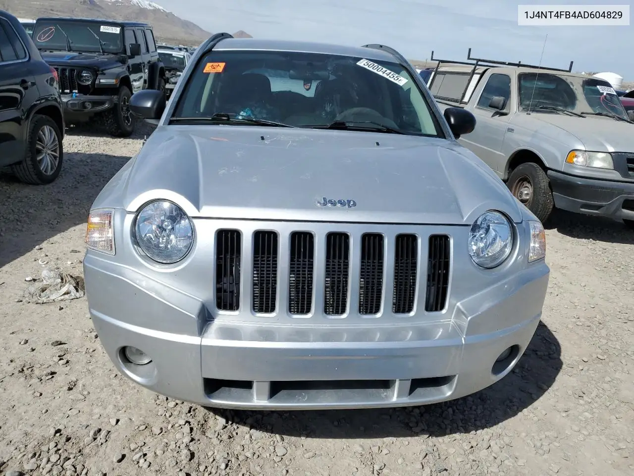 2010 Jeep Compass Sport VIN: 1J4NT4FB4AD604829 Lot: 50004455