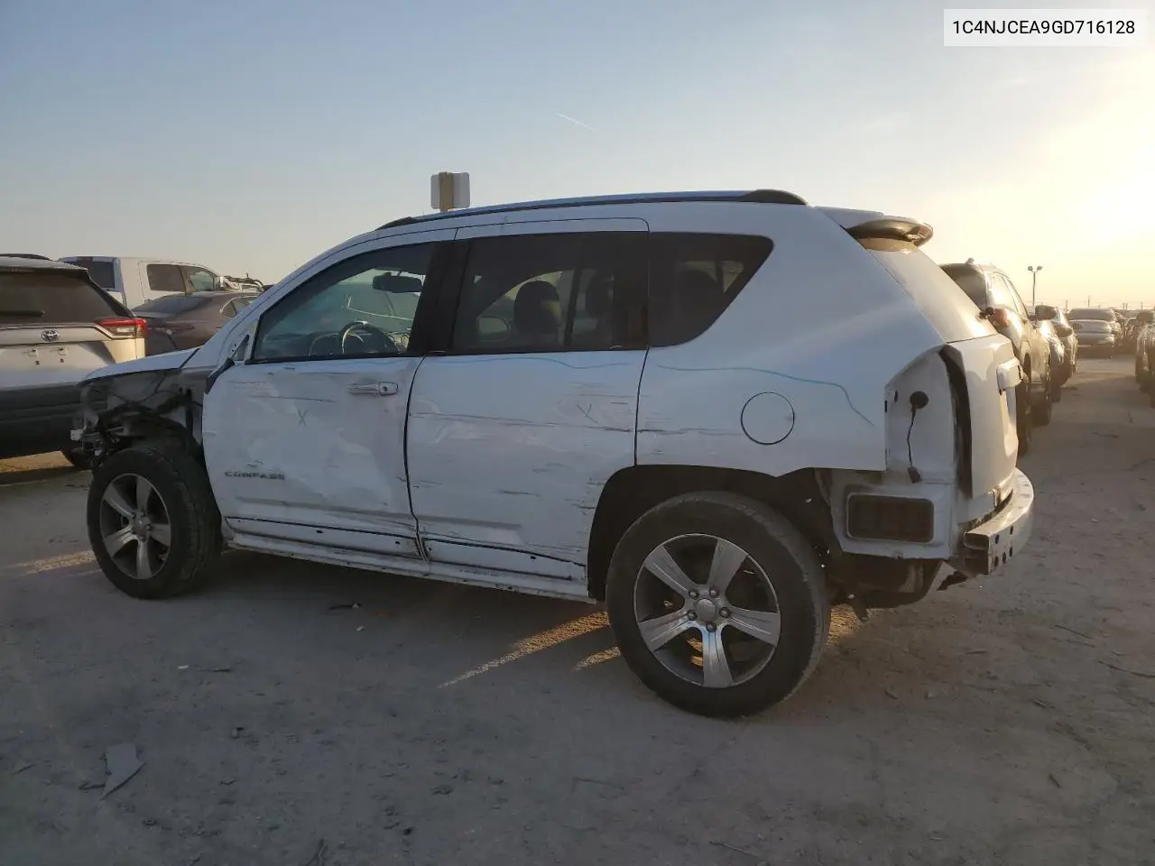 2016 Jeep Compass Latitude VIN: 1C4NJCEA9GD716128 Lot: 48543565
