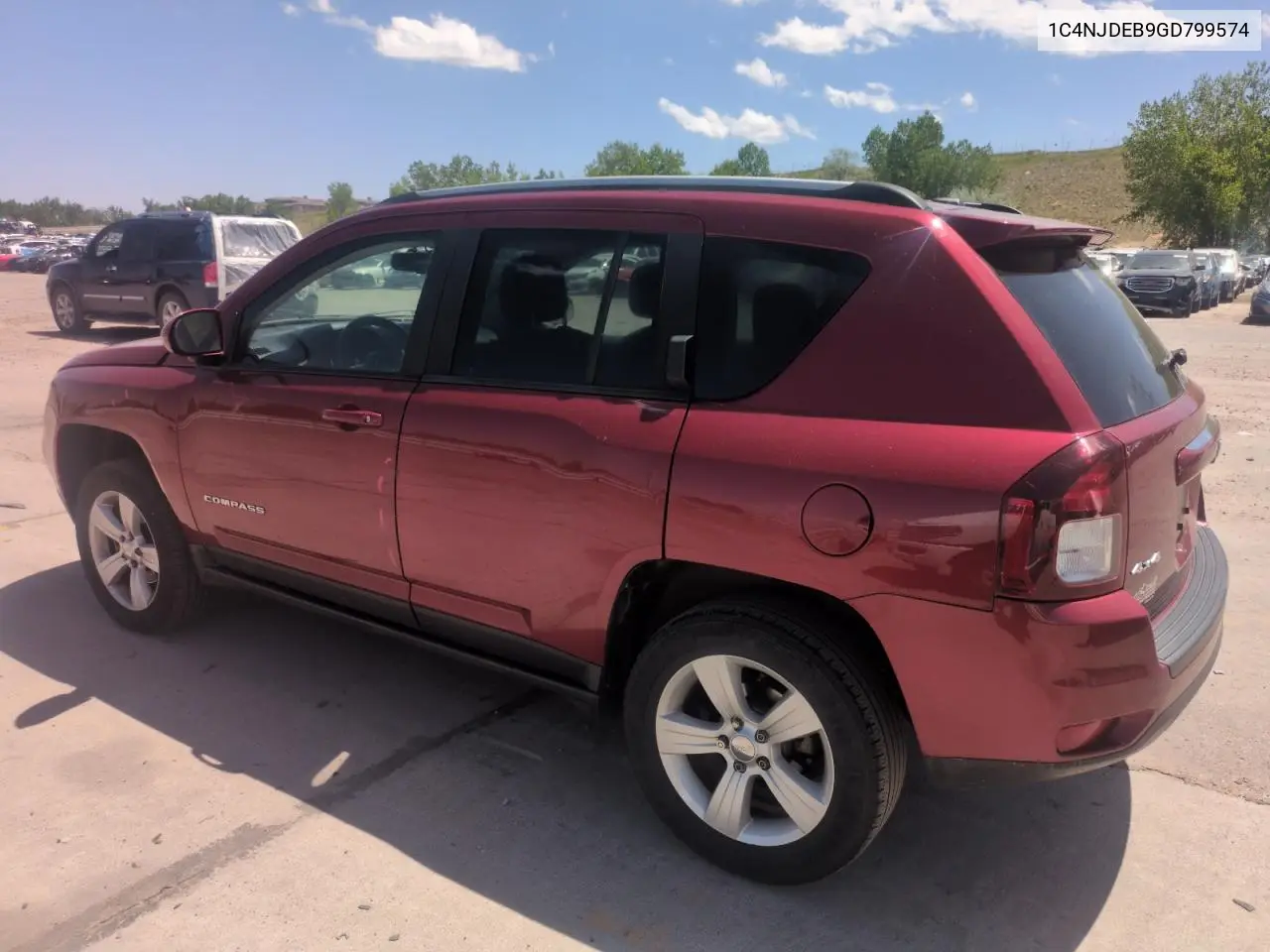 2016 Jeep Compass Latitude VIN: 1C4NJDEB9GD799574 Lot: 57171675